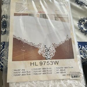 Beautiful fancy all white table cloth.